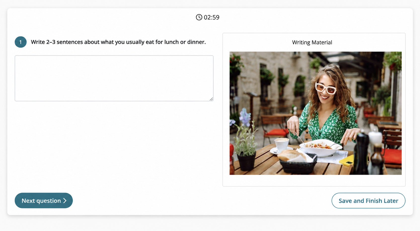 Writing assessment prompt with an empty response field and visual material